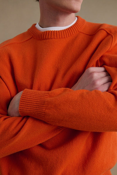 Men's orange round-neck sweater