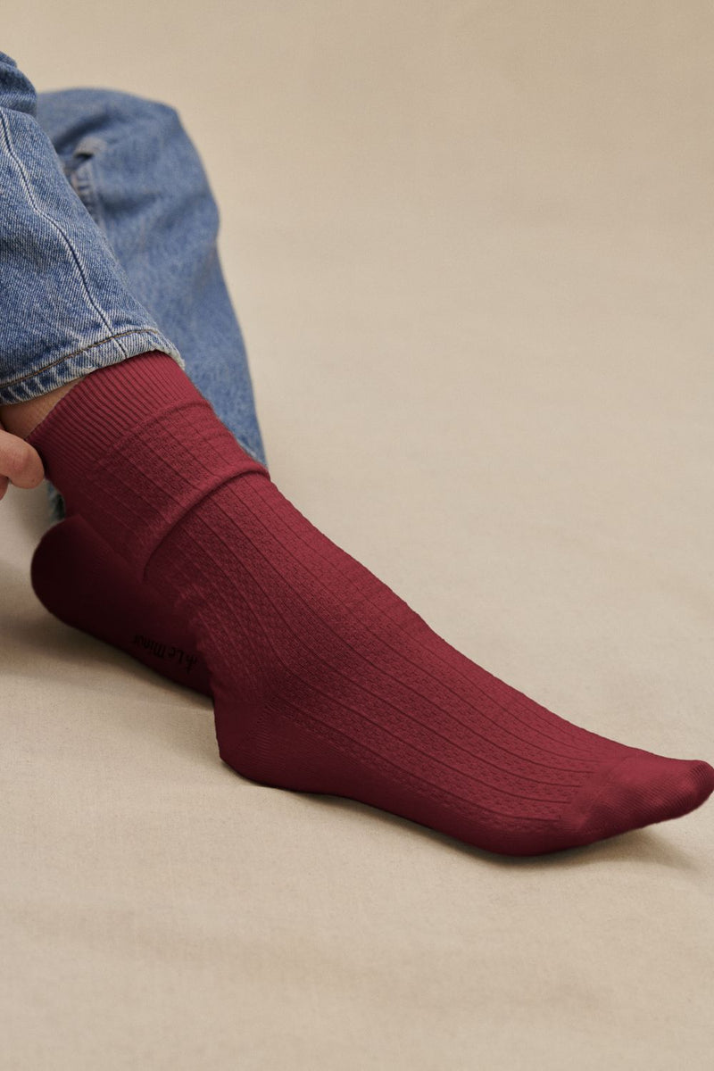 Burgundy socks in fancy stitch